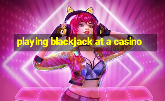 playing blackjack at a casino