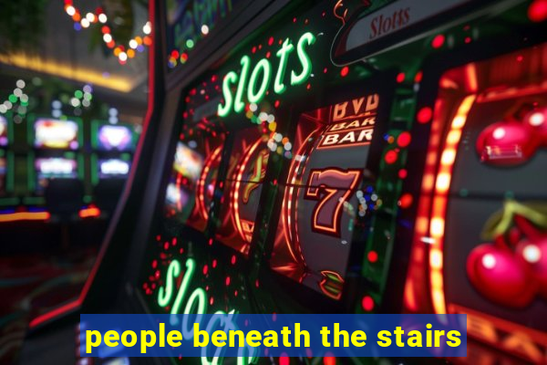 people beneath the stairs